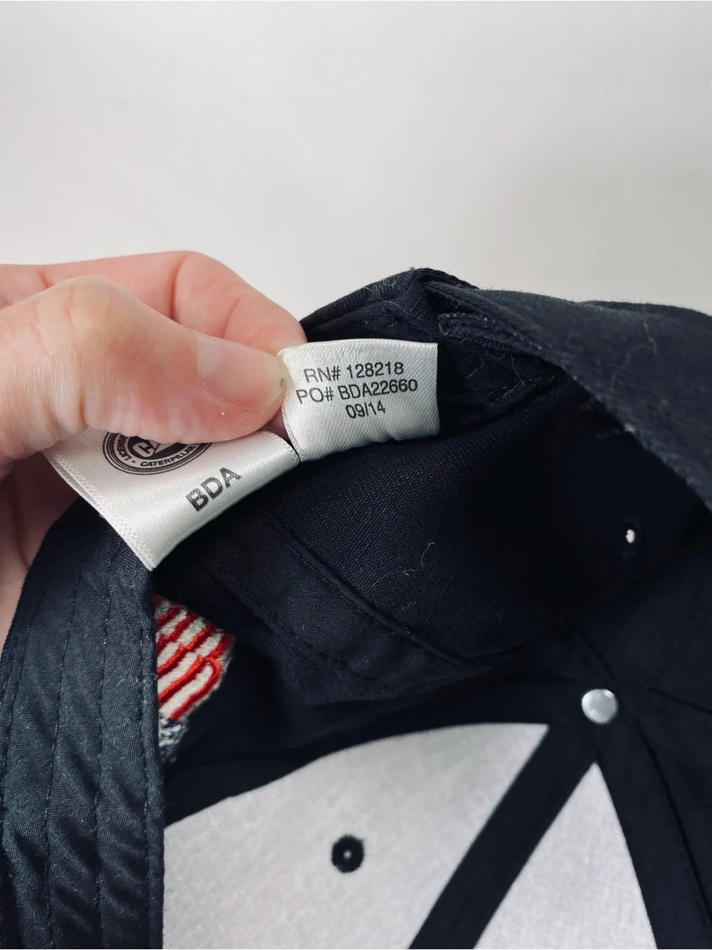 CAT Caterpillar Black Baseball Cap with White Logo and American Flag Patch